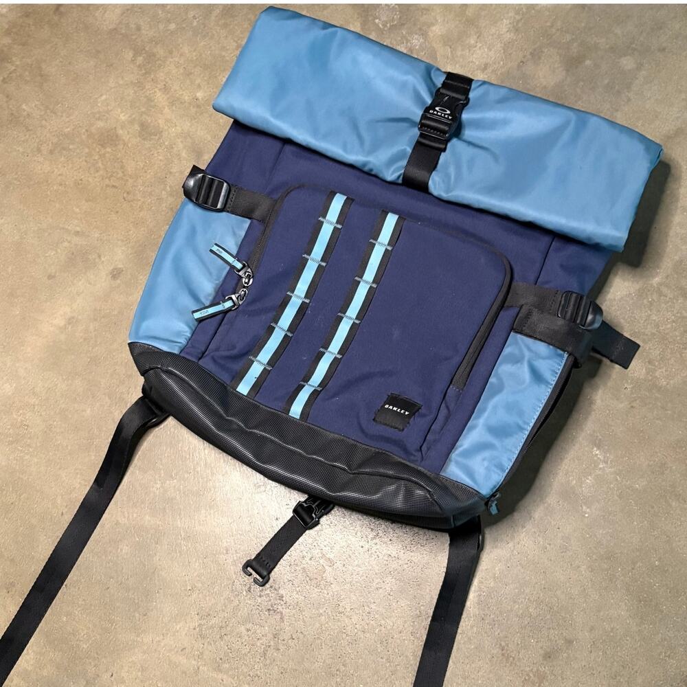 Oakley Utility Rolled Up Backpack Blue Ergonomic Straps Zip Pockets